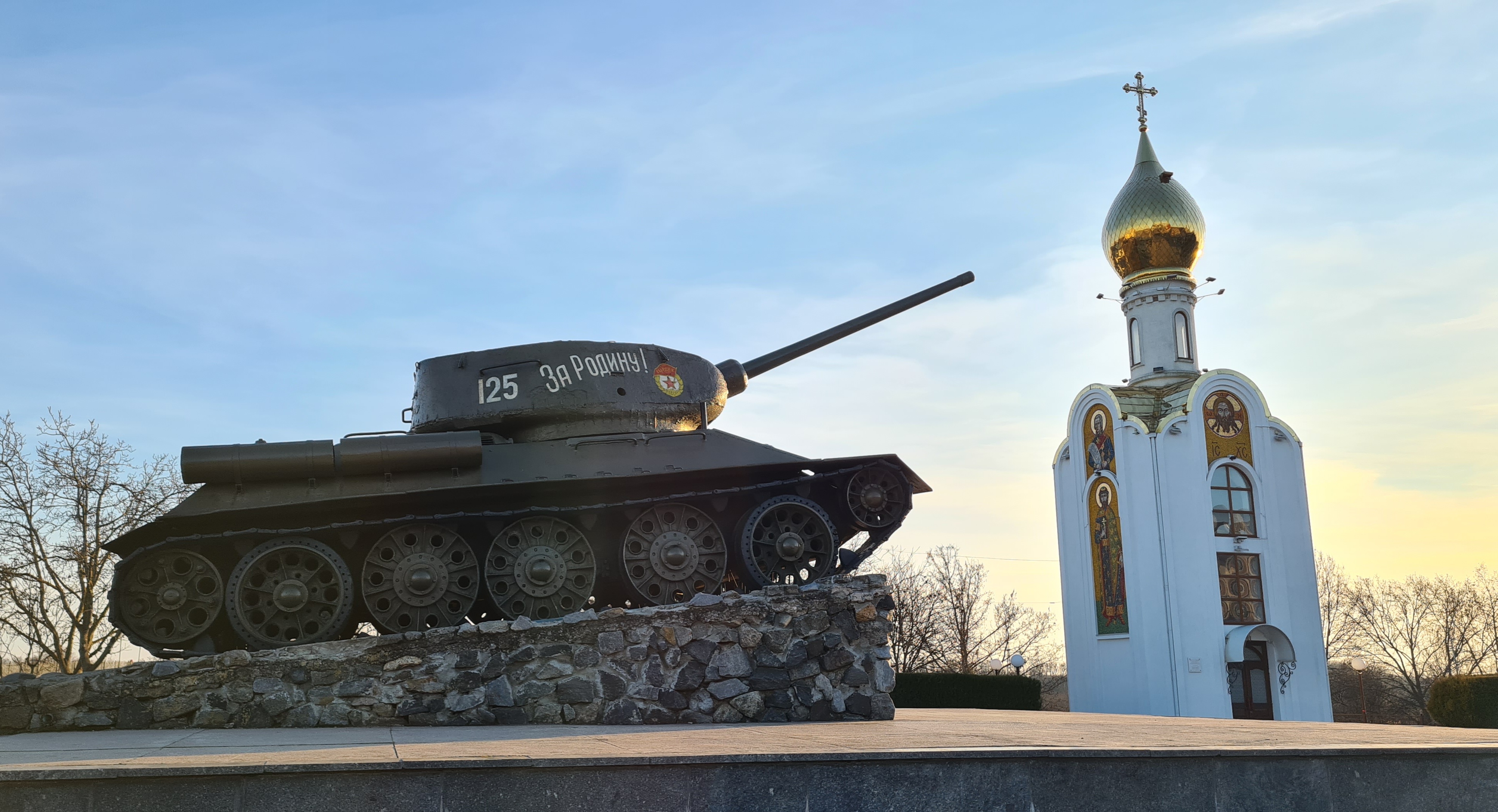 Discover Trasnistria. Tank Monument and St. George the Victorious Chapel at Memorial of Glory located on Suvorov Square of Tiraspol, the capital of Transnistria.